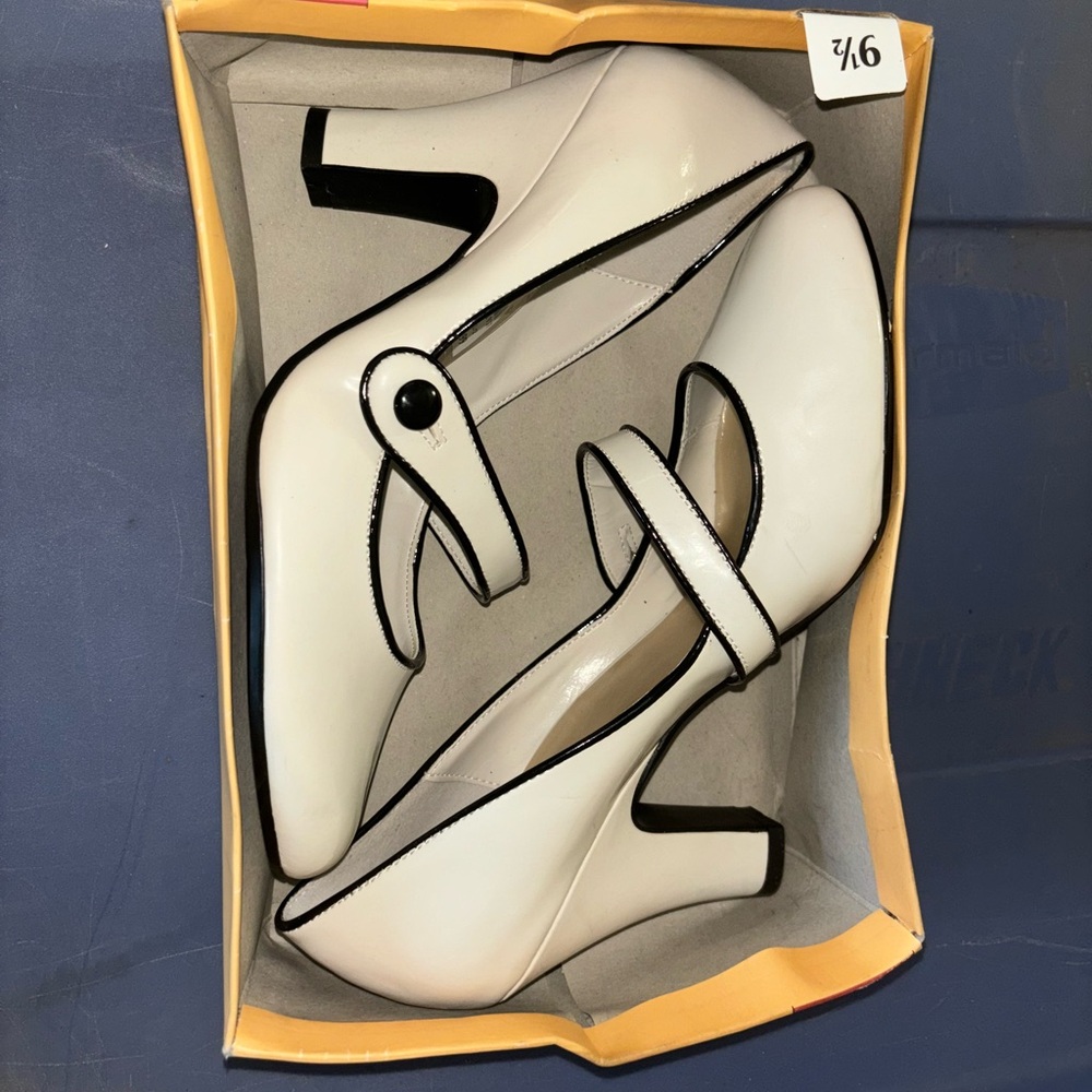 Gently Used white pair of heels